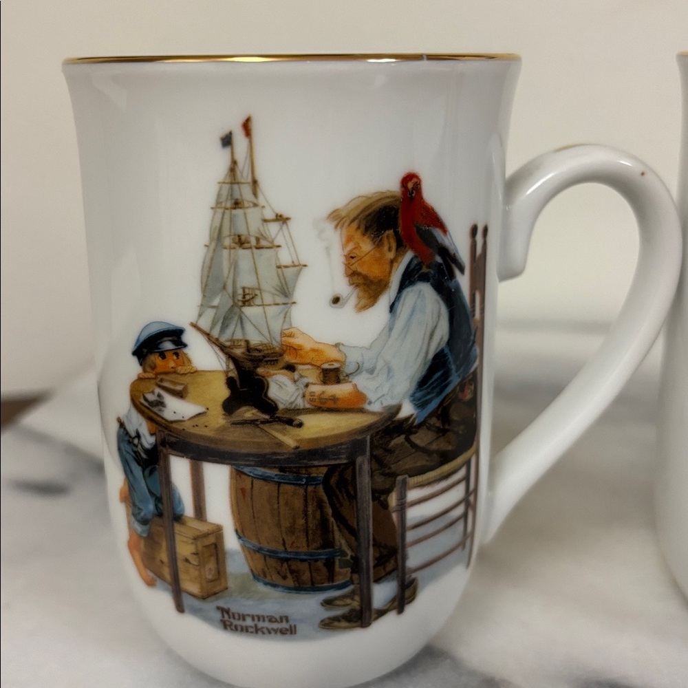 Norman Rockwell Illustrated Mugs with White and Multicolor Design - Picture 2 of 7
